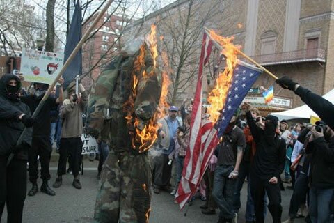 Traitorous Leftists Burning An Effigy Of A Soldier